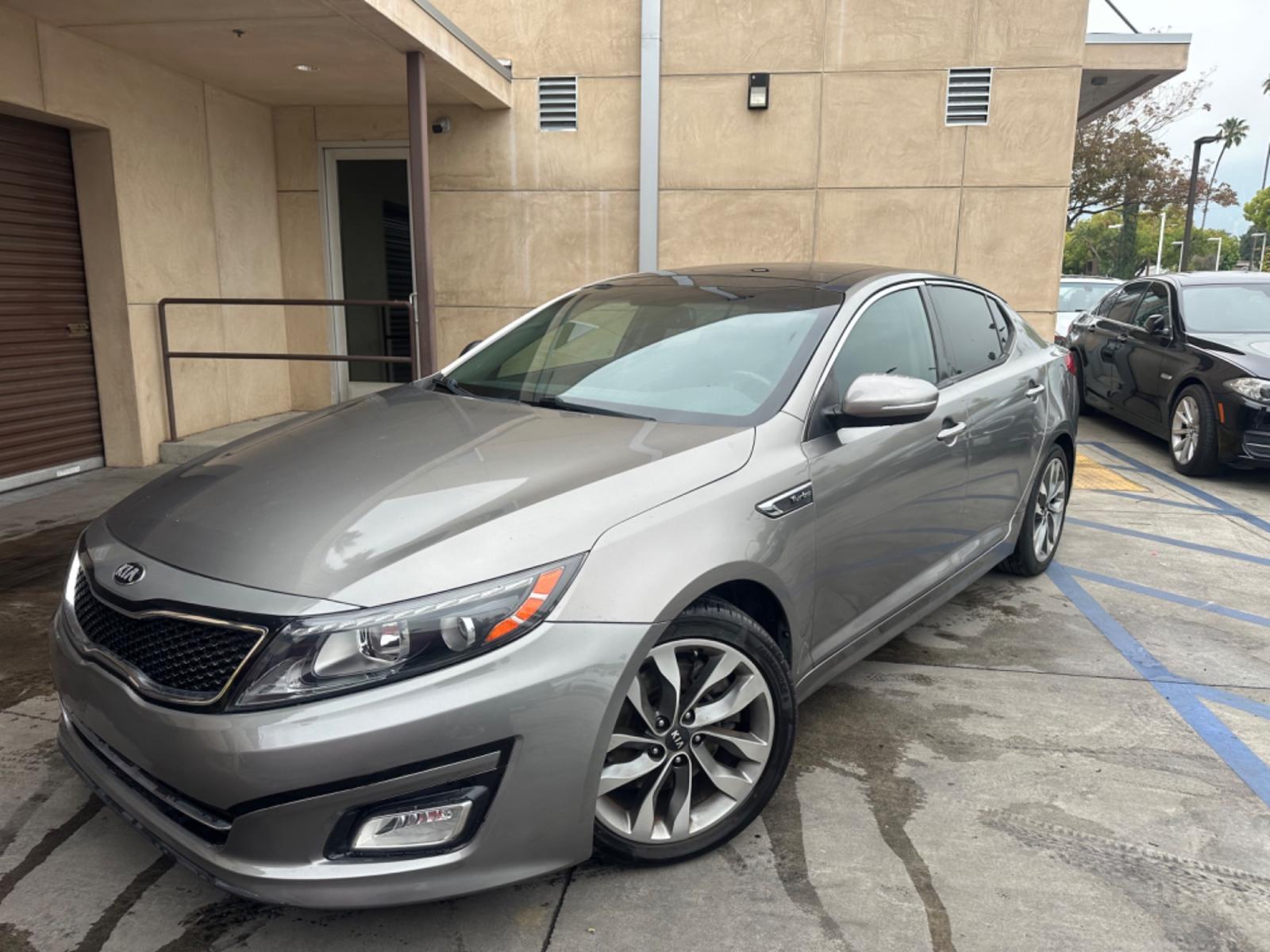 2014 Gray /BLACK Kia Optima SX Turbo (5XXGR4A62EG) with an 2.0L L4 DOHC 16V TURBO engine, 6-Speed Automatic transmission, located at 30 S. Berkeley Avenue, Pasadena, CA, 91107, (626) 248-7567, 34.145447, -118.109398 - New tires! Moon Roof! Nice Interior! Looks and drives good! Bad credit? We can help! We are the bank. All our cars are thoroughly inspected and reconditioned by our technicians. FREE CARFAX report. Stop by or call to speak with our friendly staff. Whether you have bad credit, no credit, bankruptcy, - Photo #0